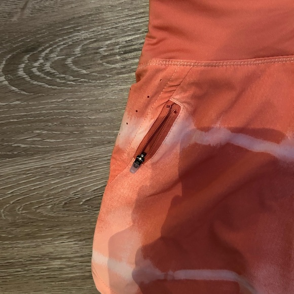 Nike Orange Athletic Shorts with Lightweight Fabric and Curved Hem - Picture 6 of 7